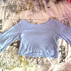 A flowy sleeve baby blue crop top